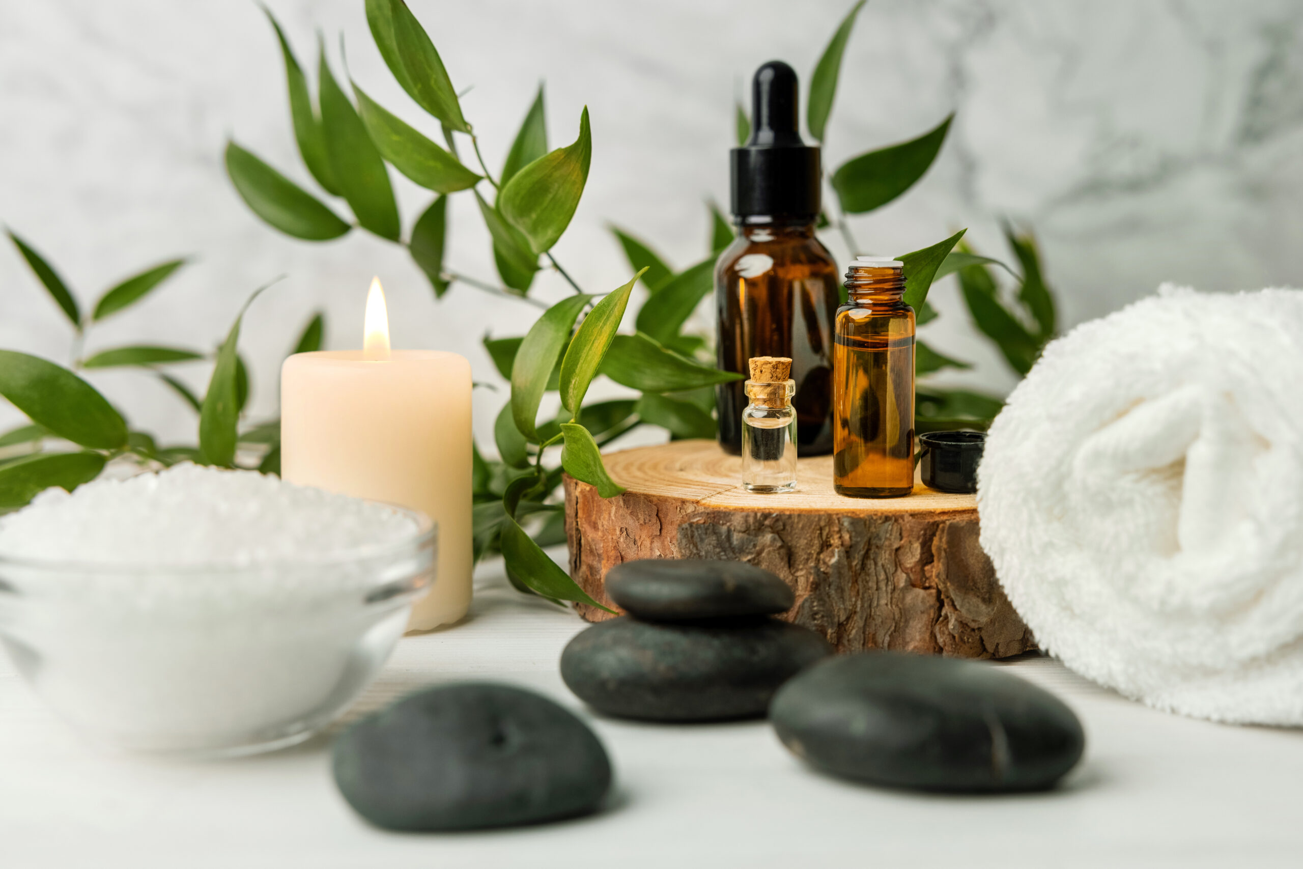 Aromatherapy oils and hot stones for hot stone massage